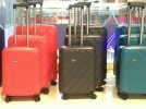 Suitcases, travel bags on wheels, cases with a combination lock in the shopping center ZhongHe Horgos